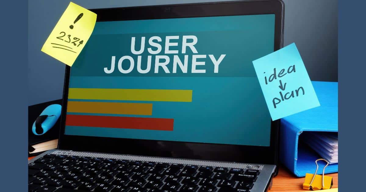 Laptop with graph and user journey